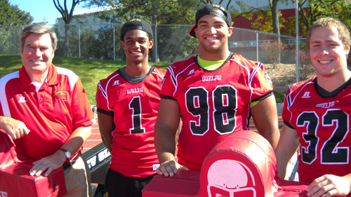 From left: Gryphon football coach Stu Lang and players A’Dre Fraser, Ian Marouf and Rob Farquharson.