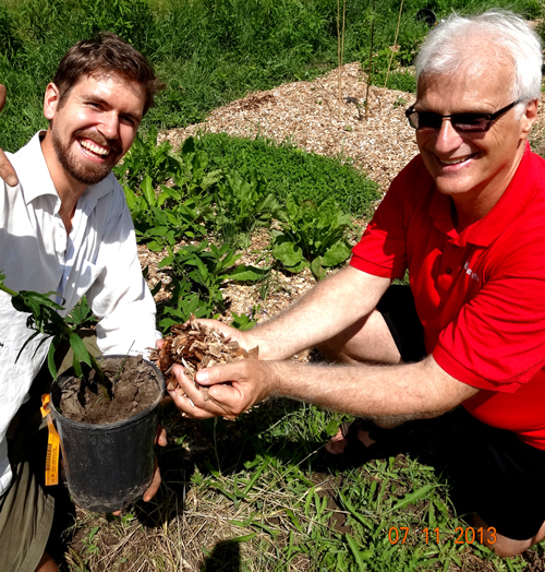 Paul Wartman, left, with one of his advisers, Prof. Ralph Martin, who holds the Loblaw Chair in Sustainable Food Production. Wartman took the photo himself and won first prize in last year’s Graduate Studies Photography Competition.