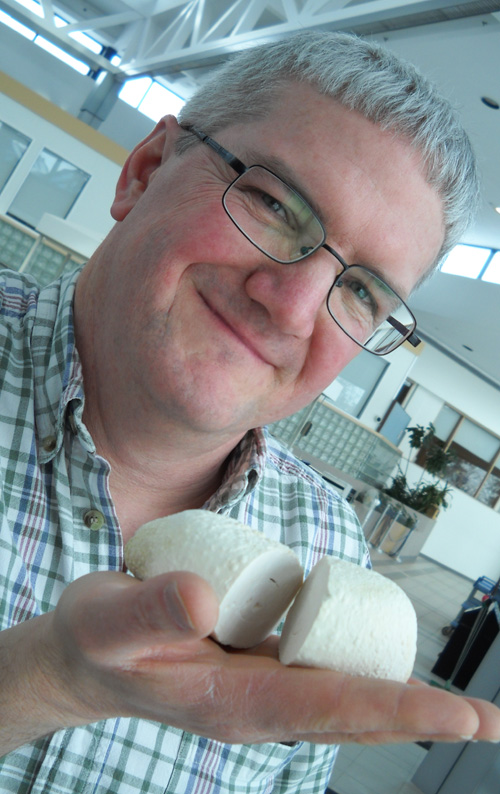 Andrew Moore holds a bladder stone.
